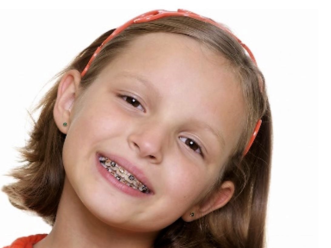 Young patient receiving a Phase One early orthodontic evaluation from a Kendall specialist.